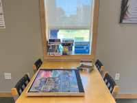 Jigsaw Puzzles on a wooden table