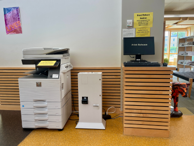 Large printer and a computer in the library for patron use