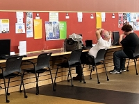 computers and seating along a wall